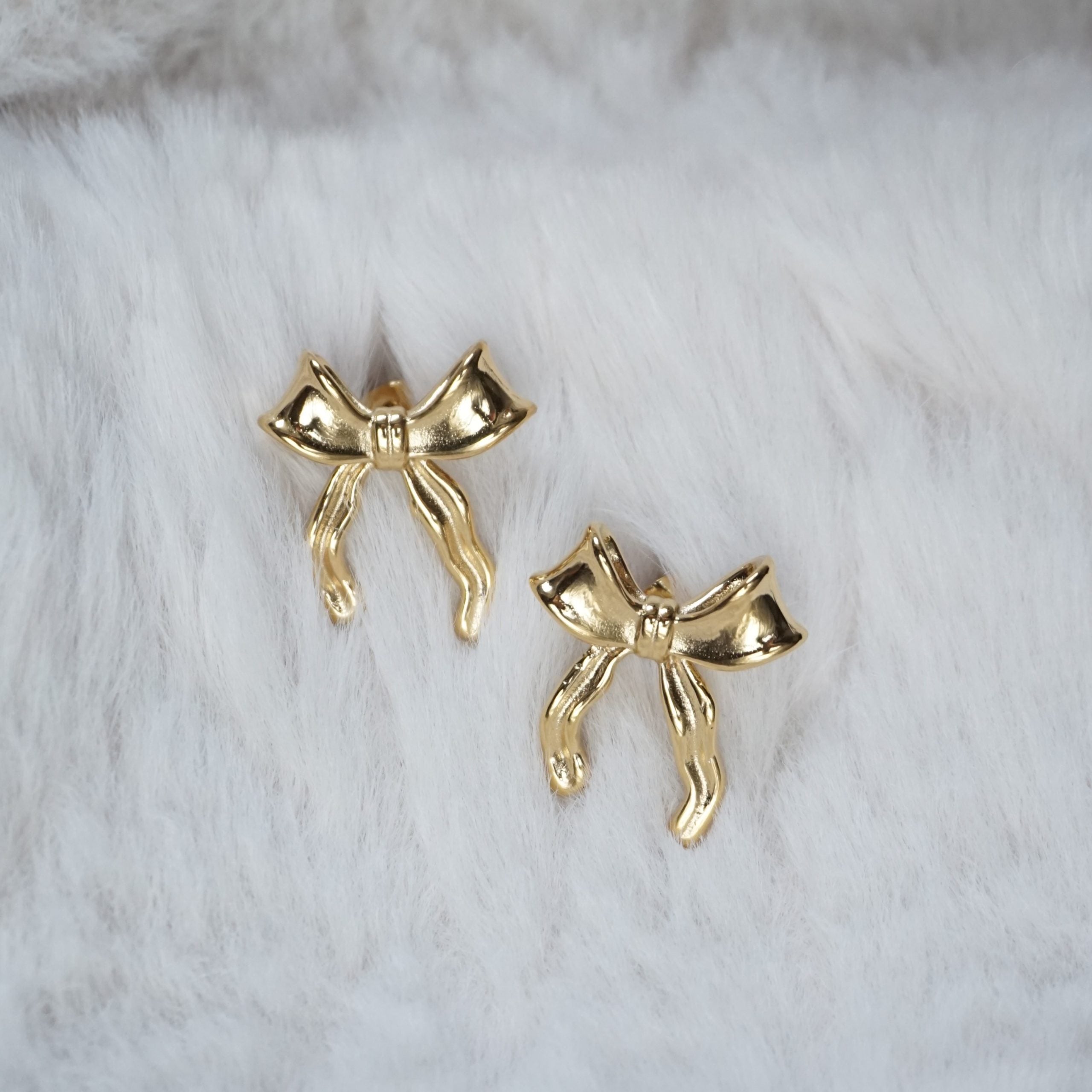 gold maxi bow stud earrings