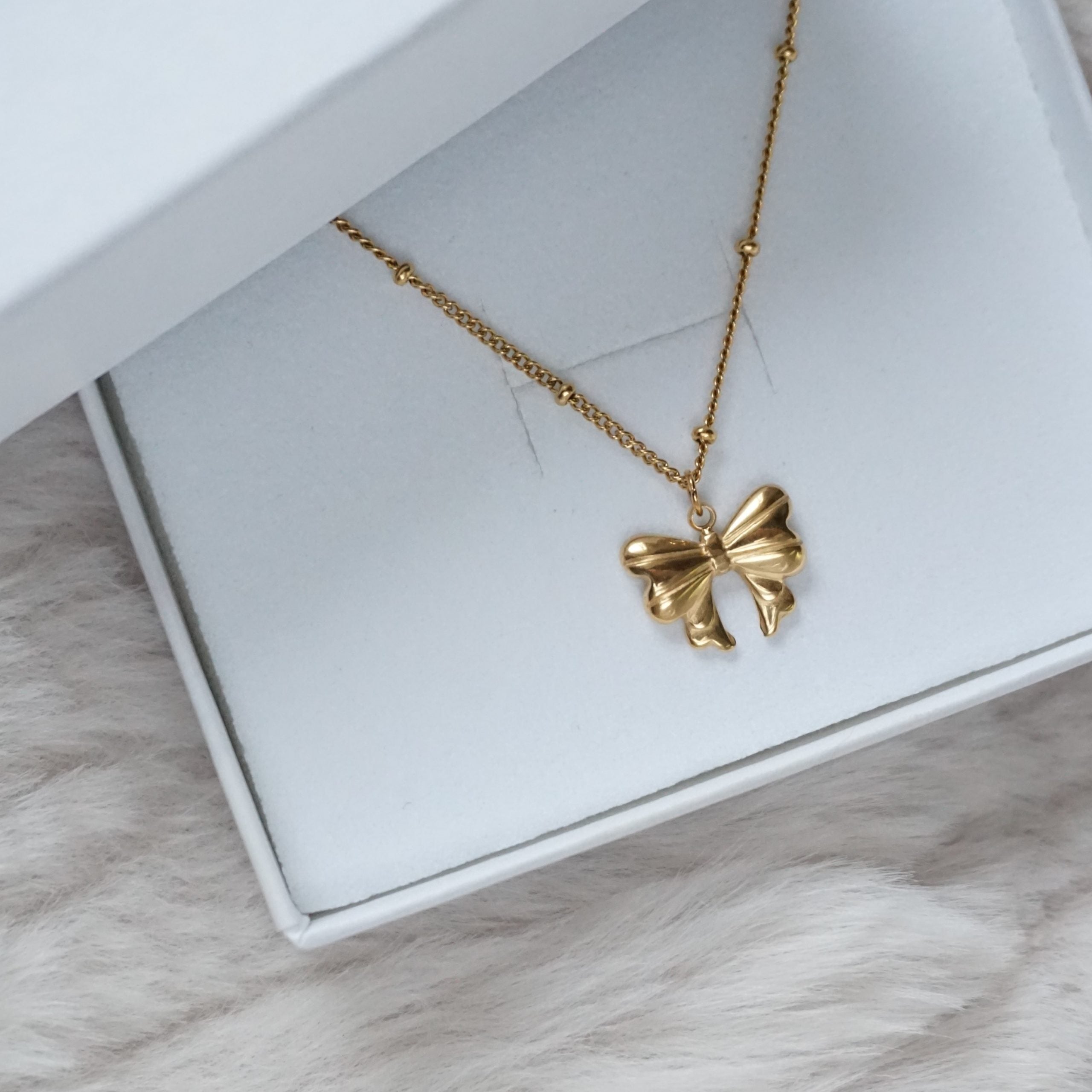 gold bow necklace