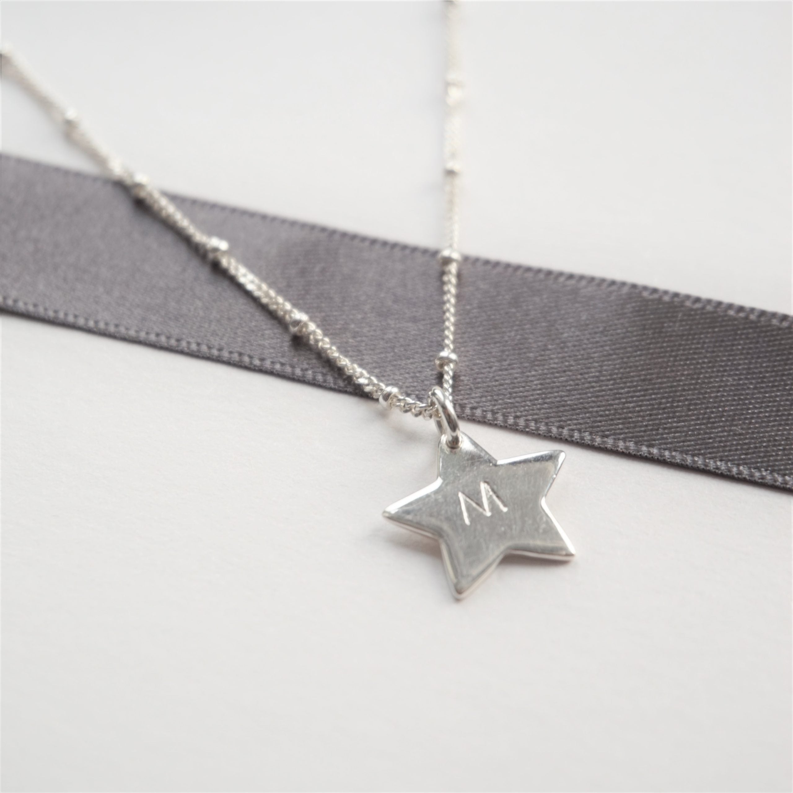 sterling silver necklace with stamped star charm