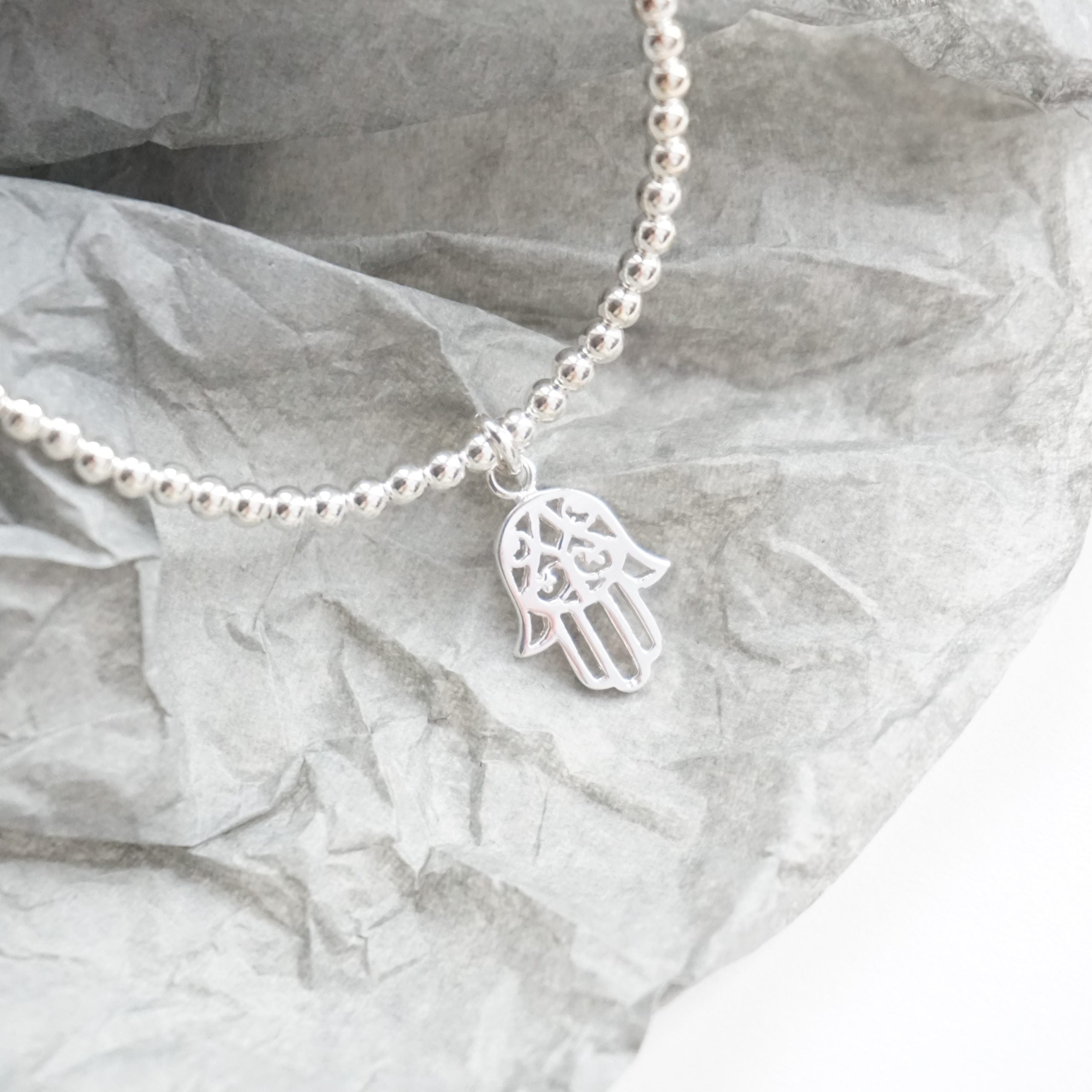 Sterling silver anklet with hamsa hand charm