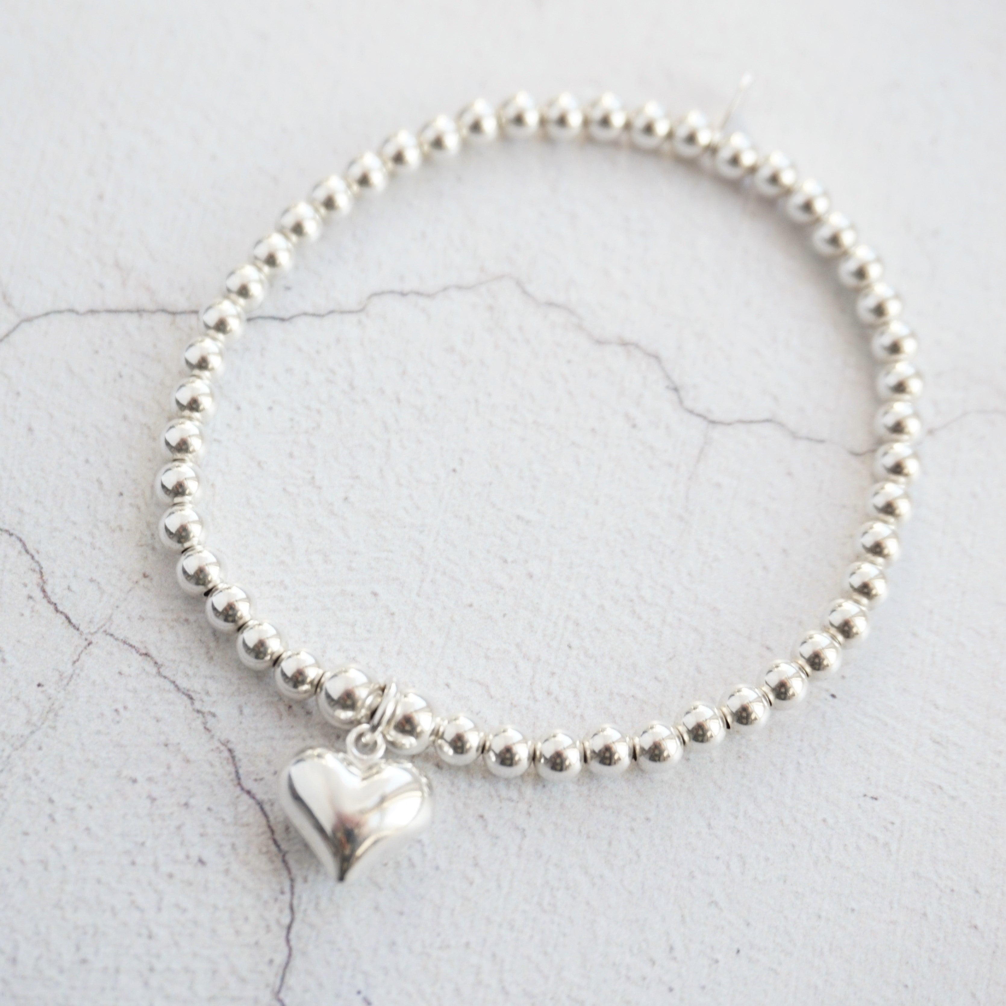 sterling silver bracelet with large heart charm