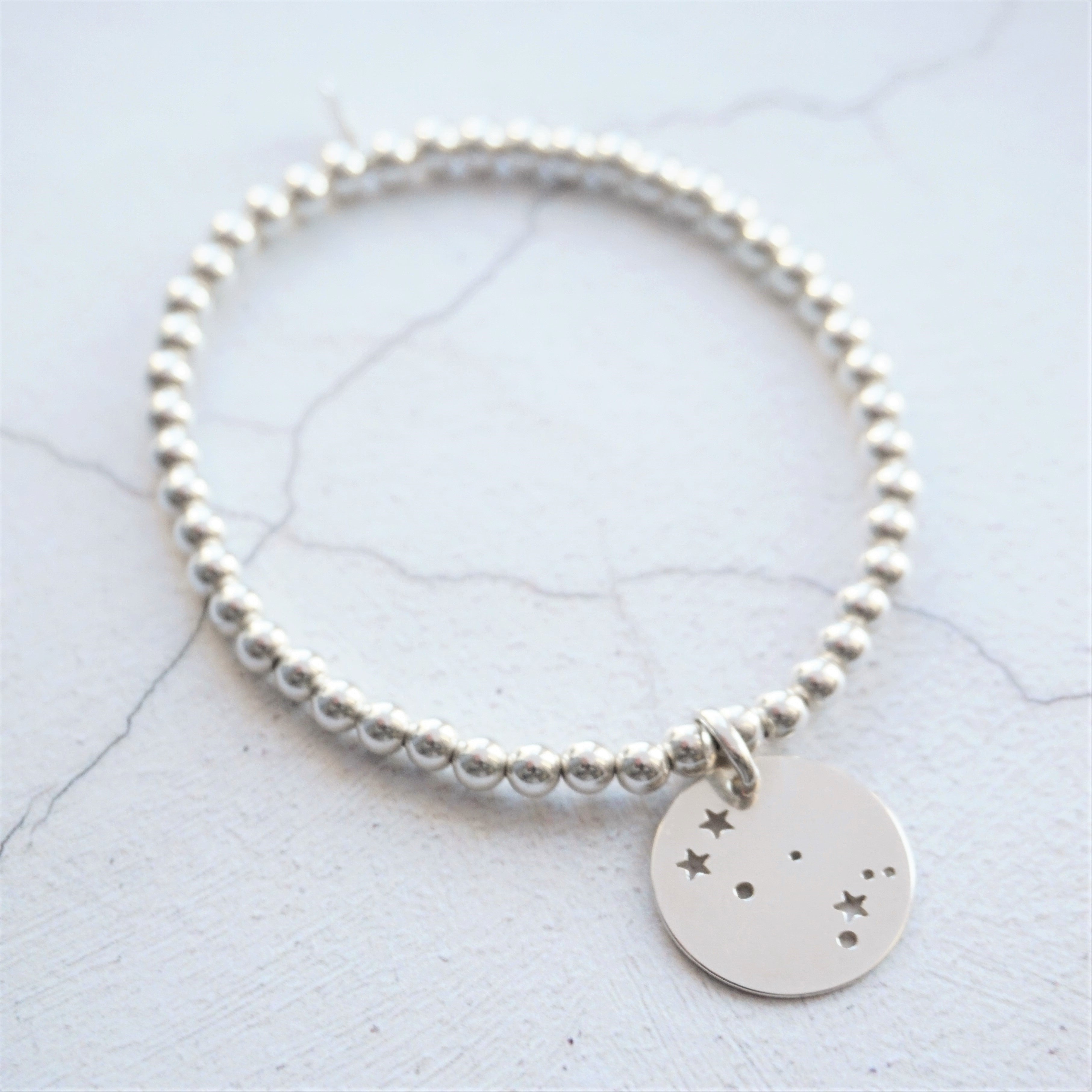 sterling silver bracelet with constellation charm