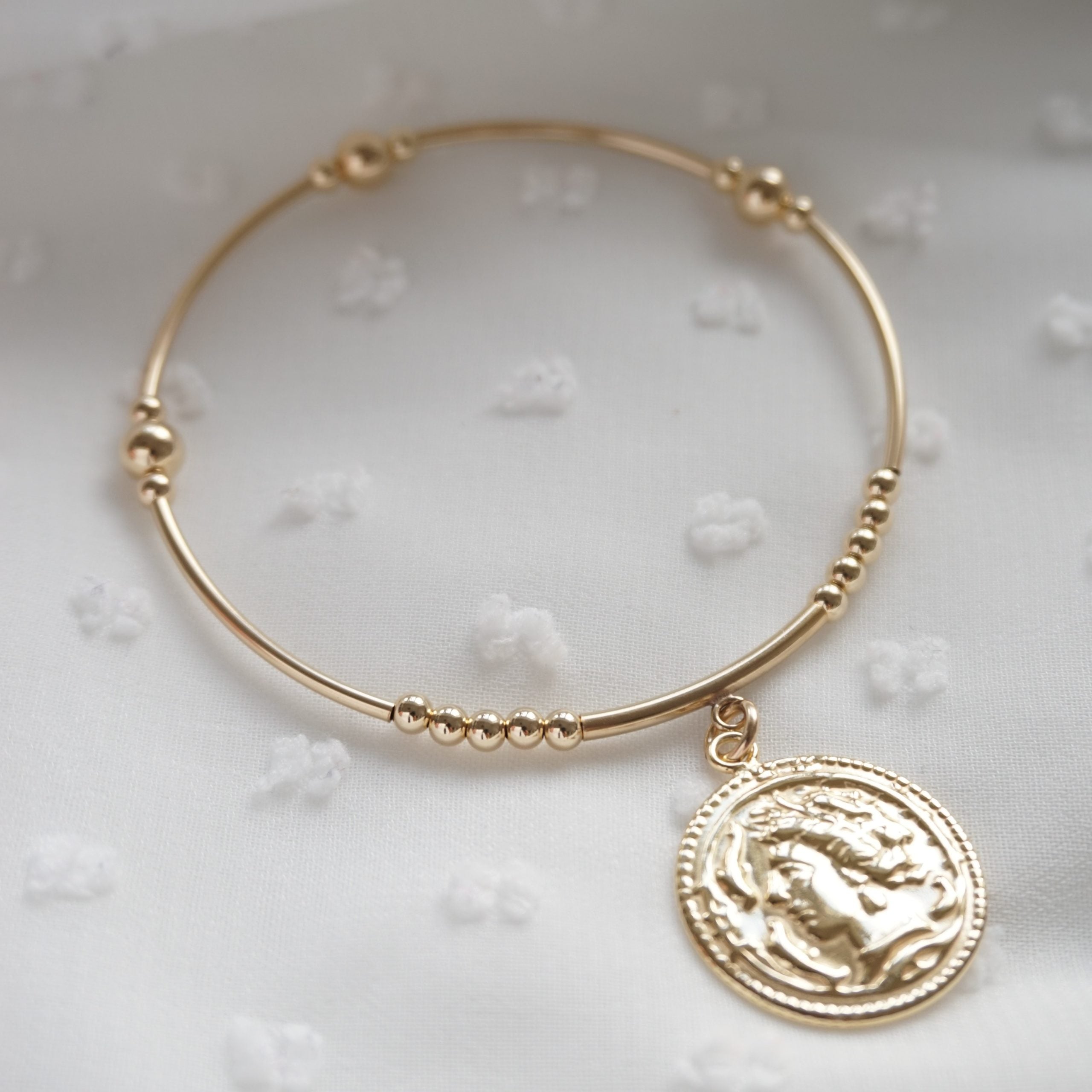 gold roman coin noodle bracelet