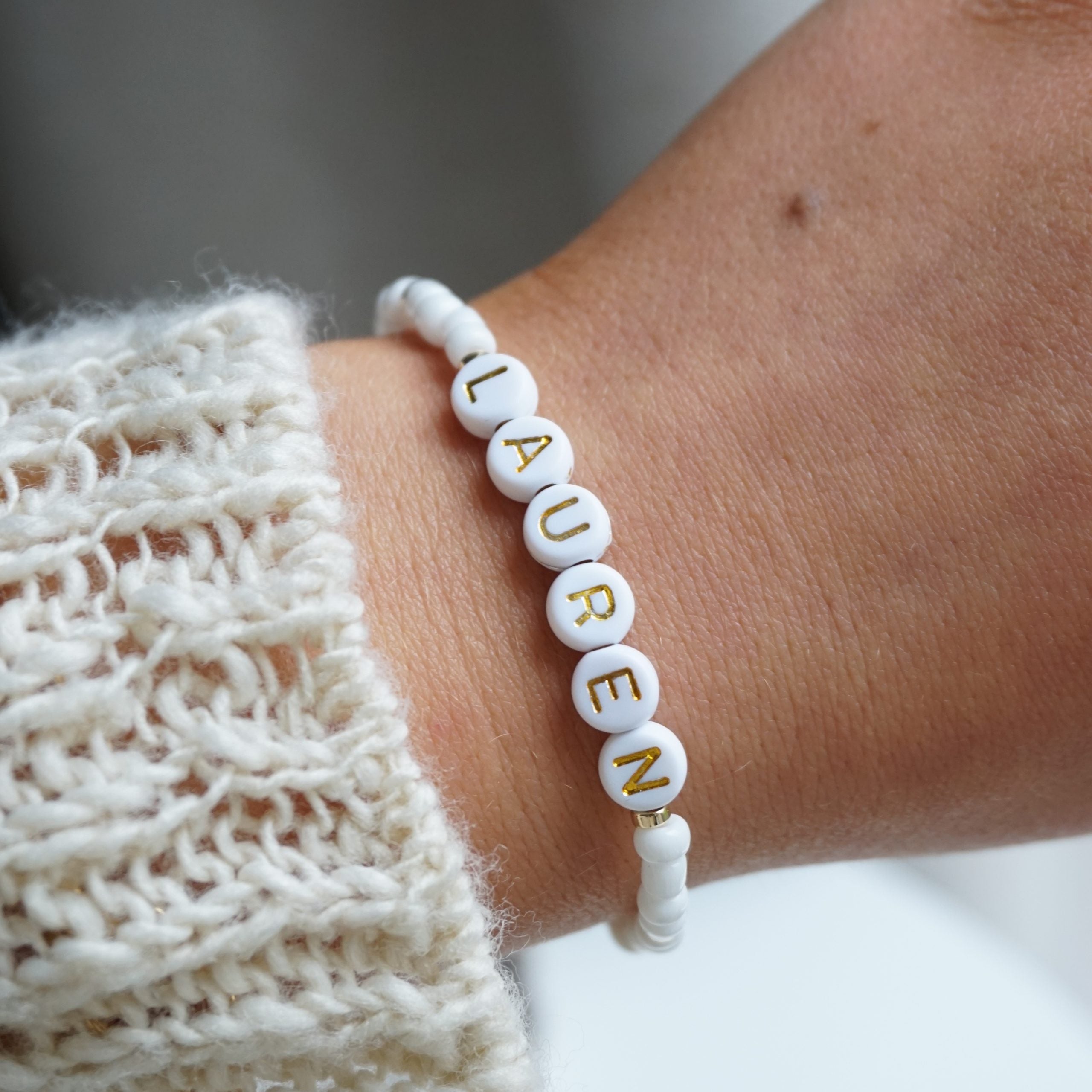 Gold personalised white beaded bracelet