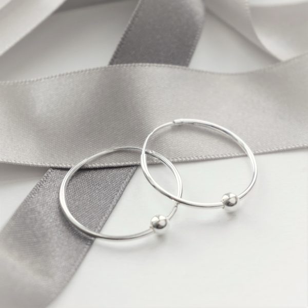 Sterling silver hoop earrings with ball beads