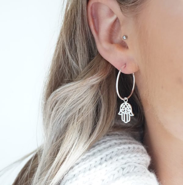 Sterling silver hoop earrings with hamsa hand charms