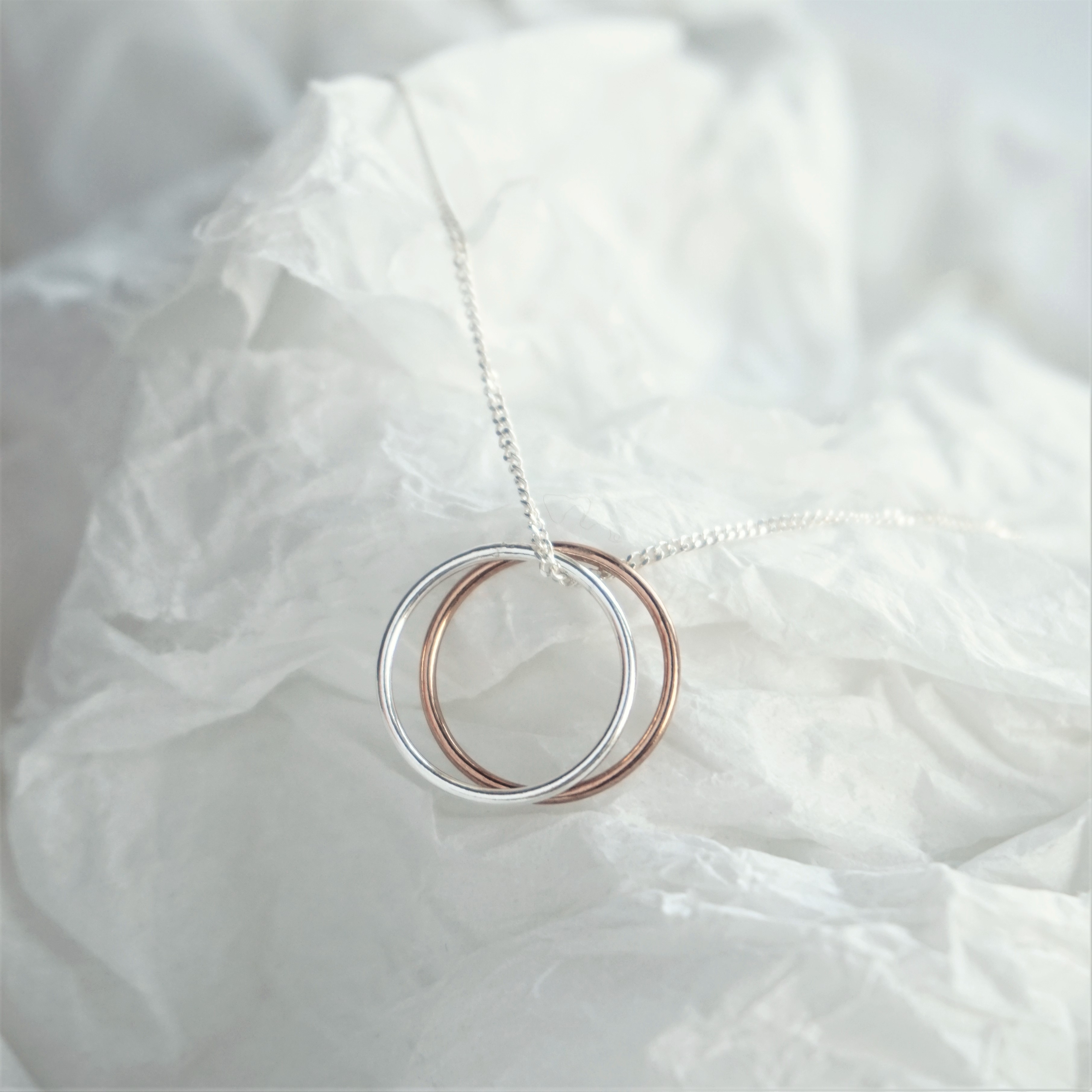 sterling silver and rose gold eternity rings necklace