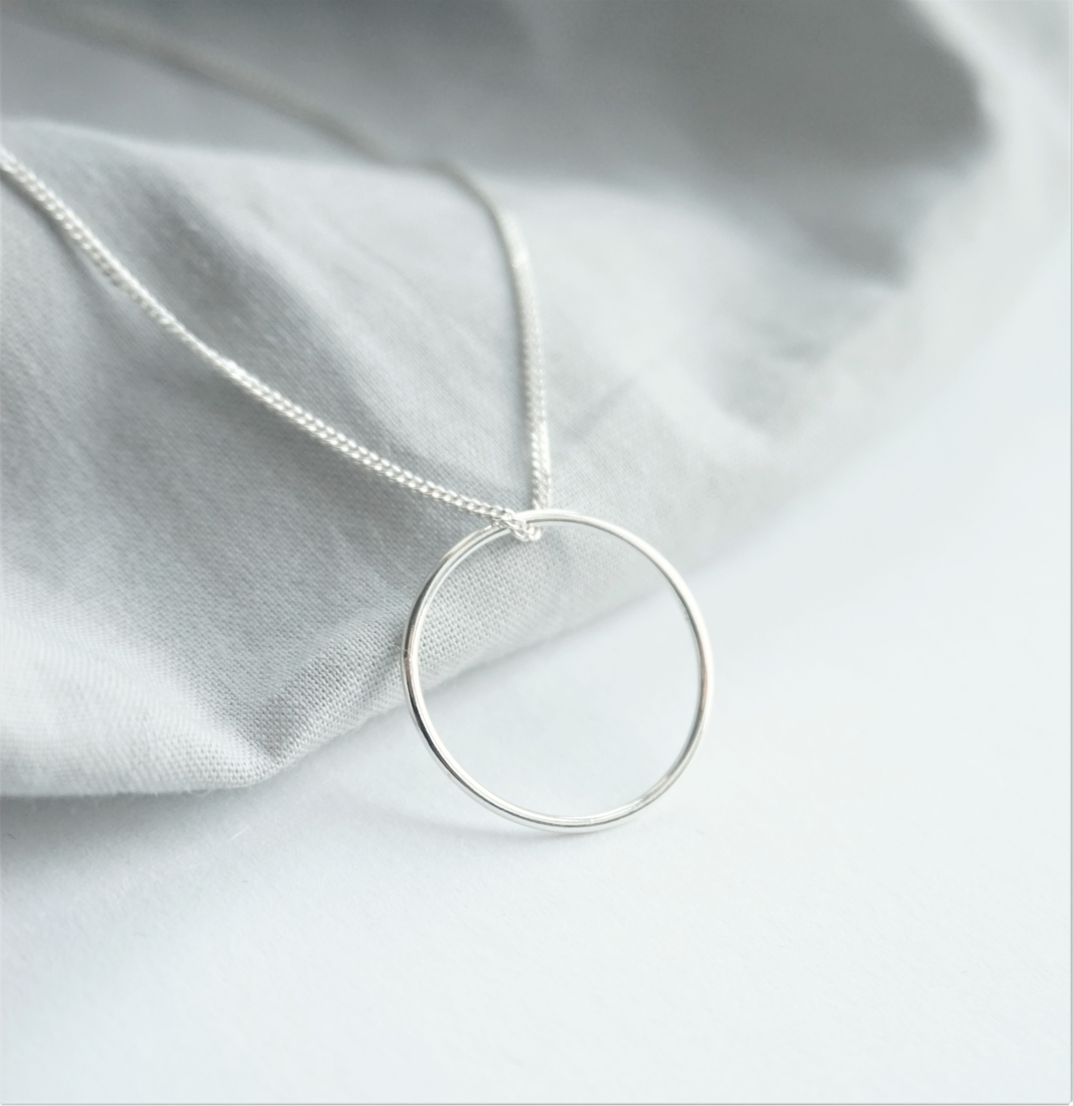 sterling silver necklace with karma circle