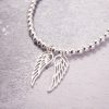 Sterling Silver Stretch Bracelet with Two Large Angel Wing Charms