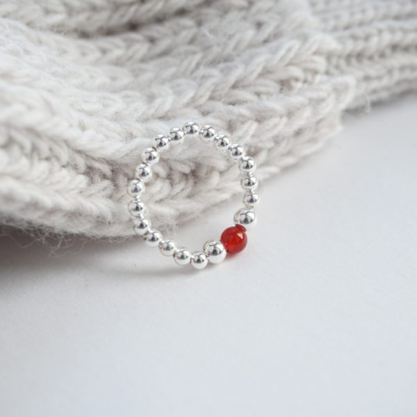 Sterling silver stretch ring with carnelian bead