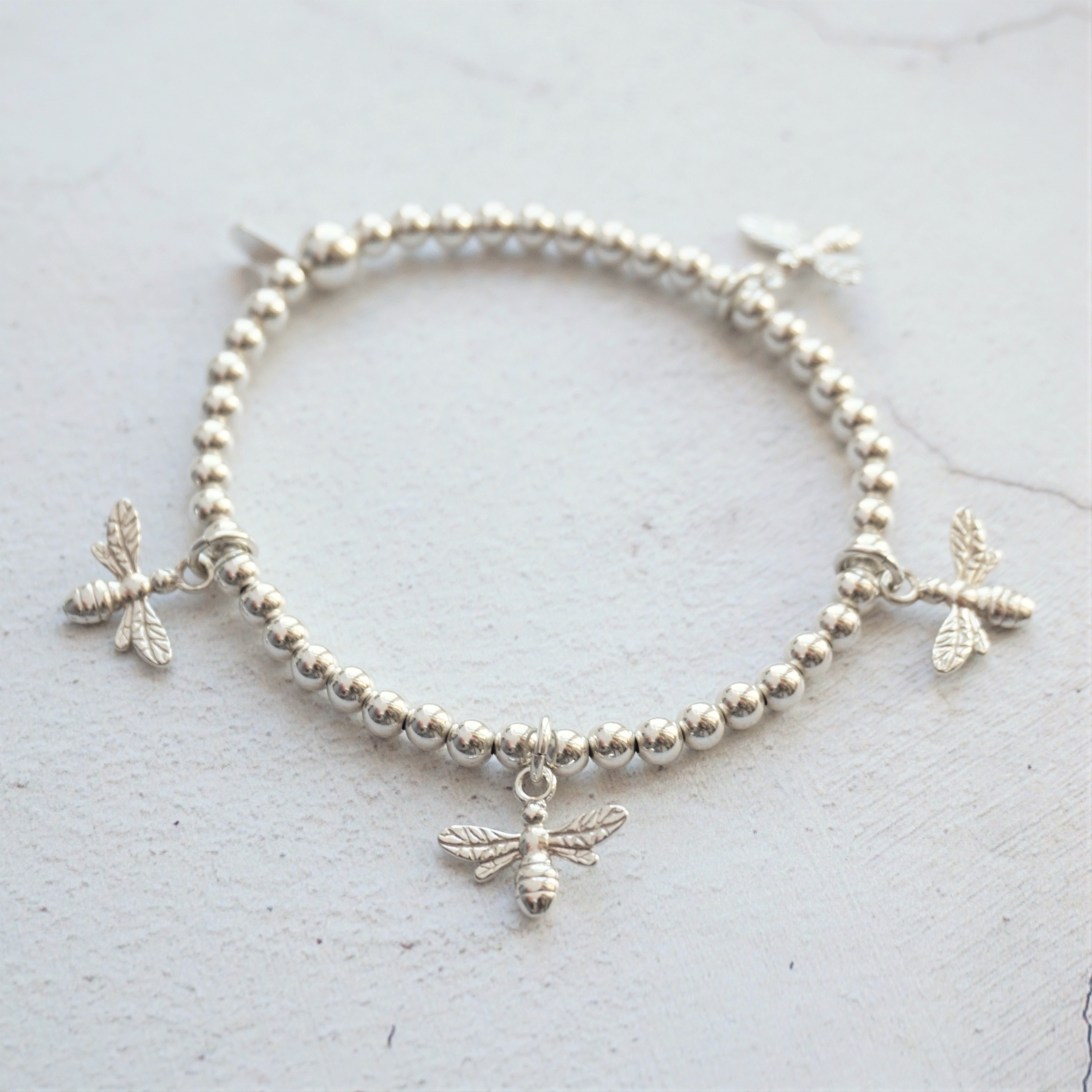 sterling silver bracelet with bumble bee charms