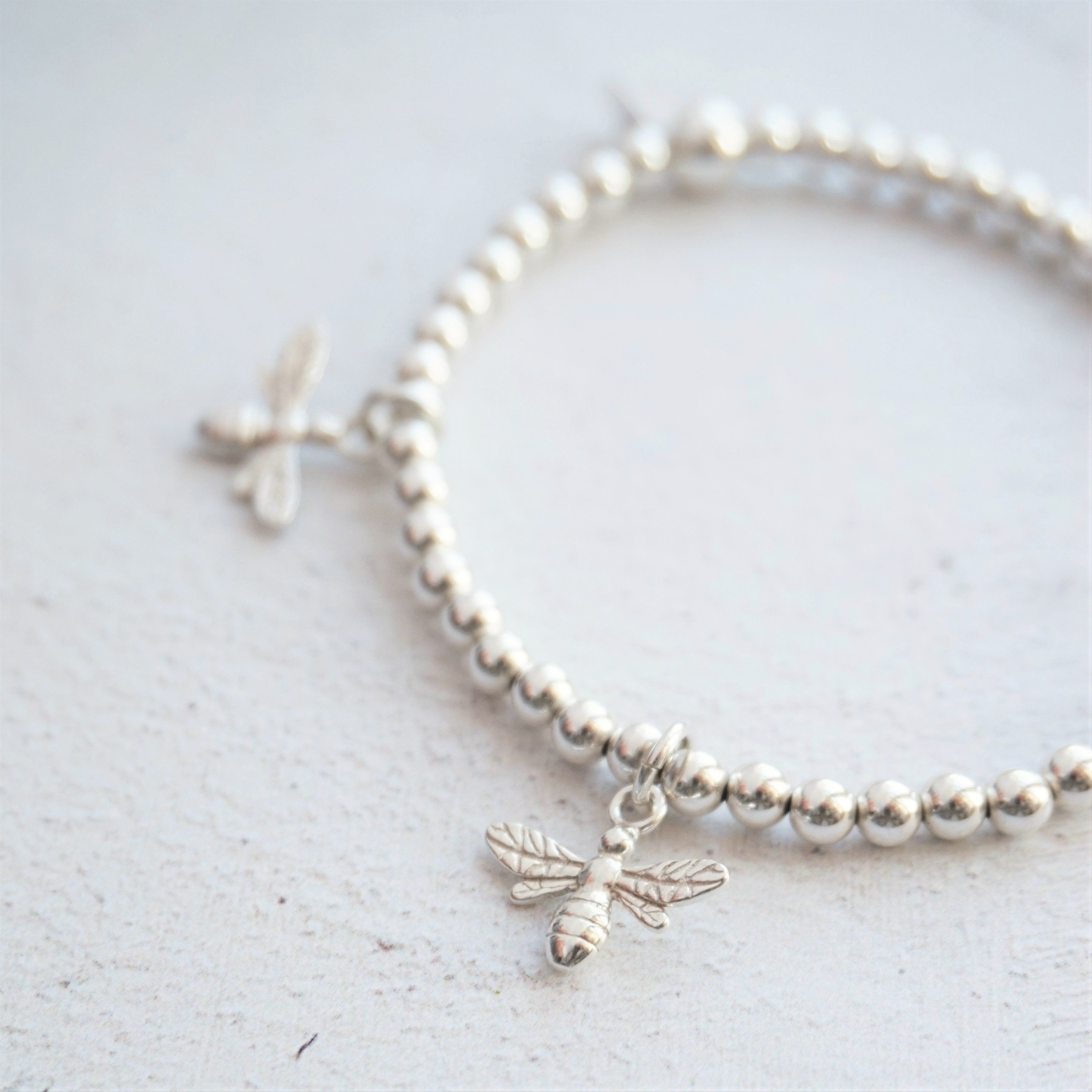 sterling silver bracelet with bumble bee charms