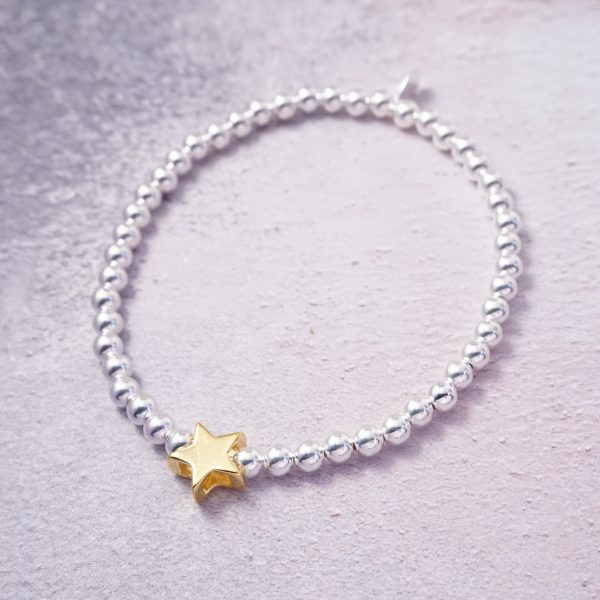 Sterling Silver Stretch Bracelet with Gold Star Bead