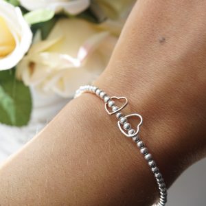 Sterling silver and rose gold hearts bracelet