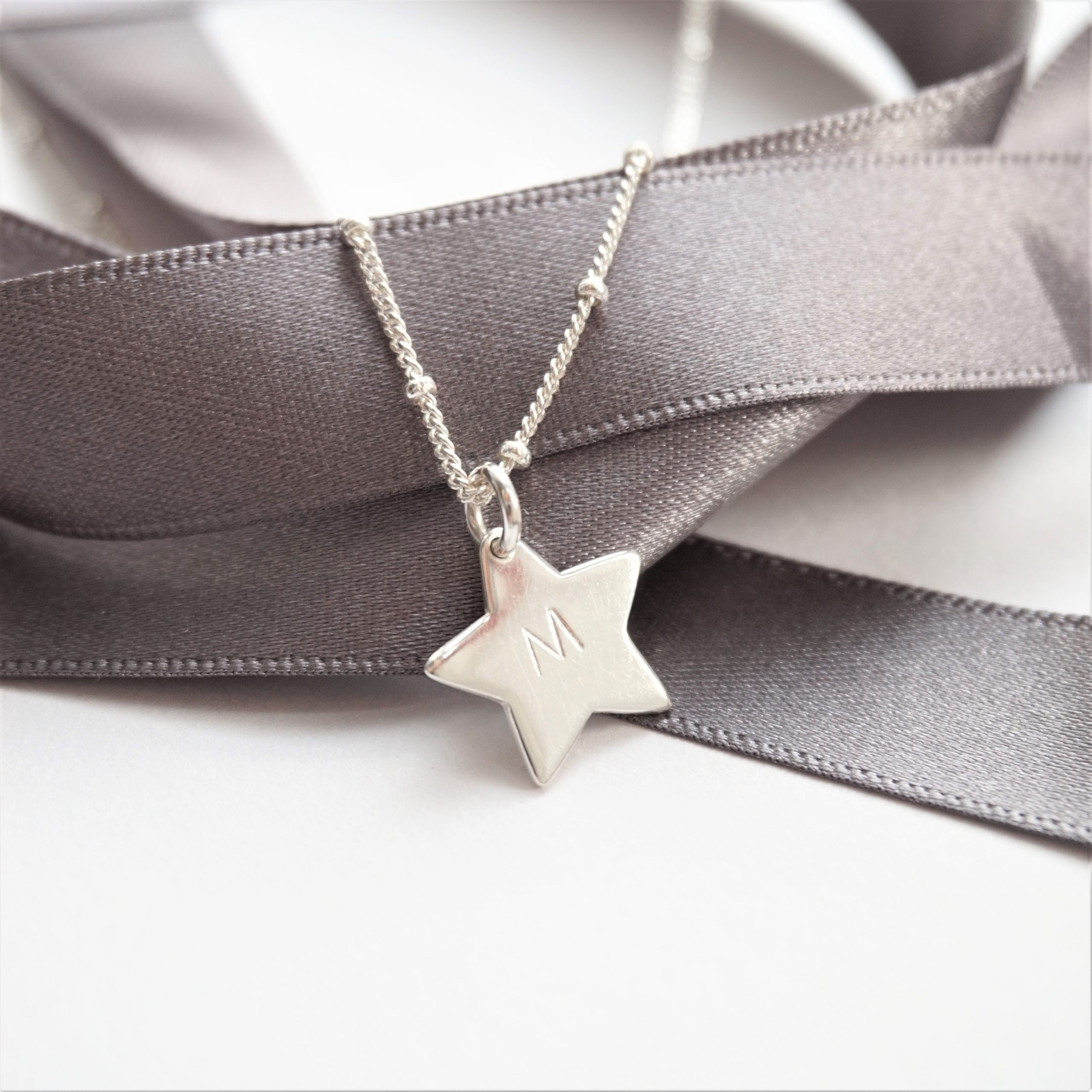 sterling silver necklace with stamped star charm