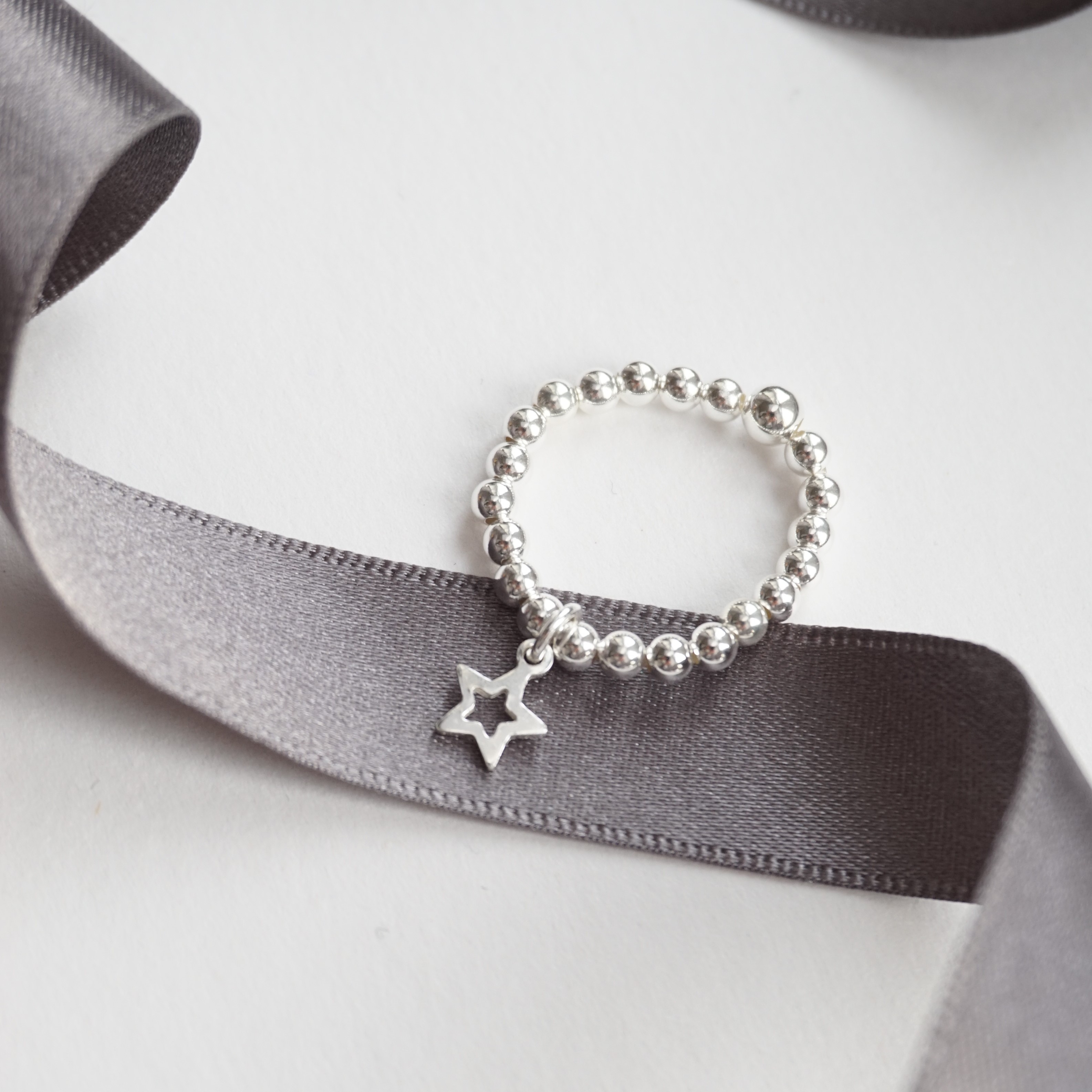 sterling silver ring with star charm
