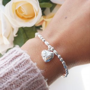 sterling silver bracelet with hammered heart charm
