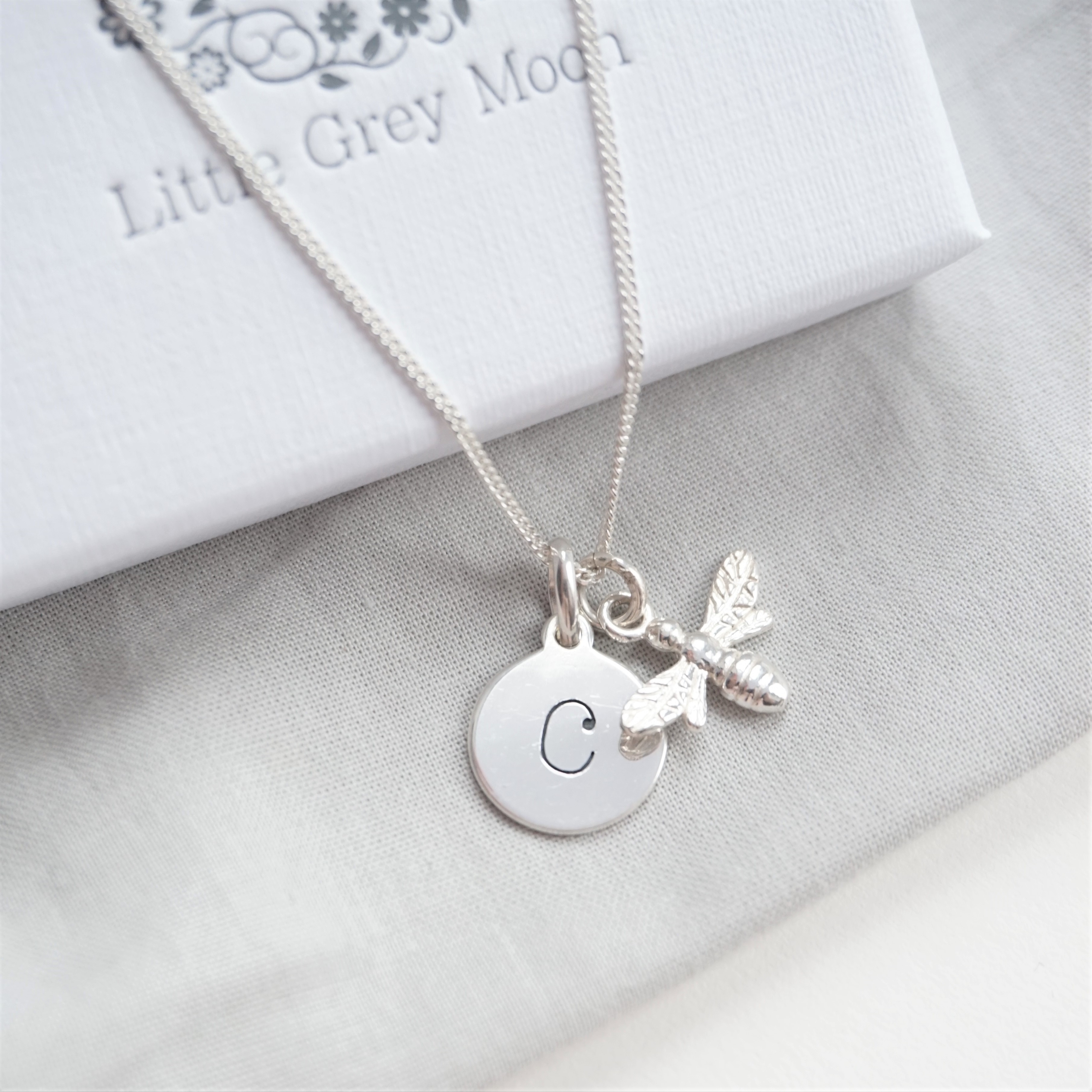 Sterling silver necklace with lowercase initial and bee charm