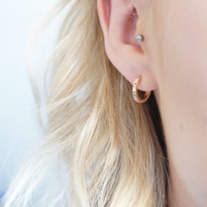 gold rainbow huggie hoop earrings