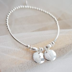 sterling silver beaded noodle bracelet with duo stamped discs