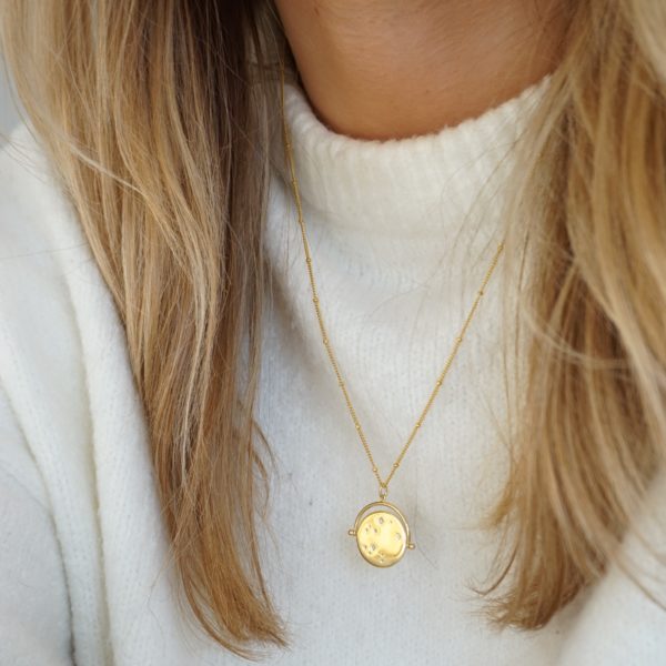 gold sky spinner necklace