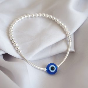 sterling silver beaded noodle bracelet with evil eye