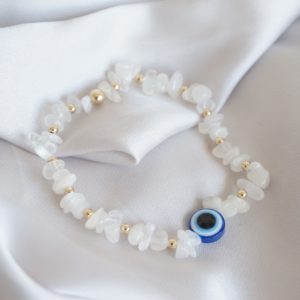 gold and moonstone chip bead bracelet with evil eye