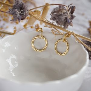 gold circle entwined circle stud earrings