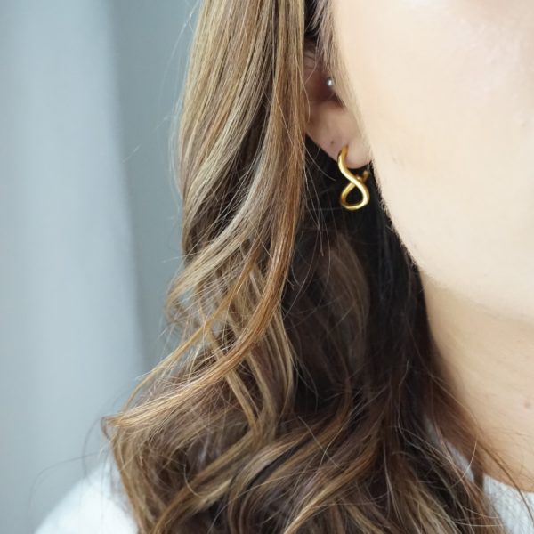 gold fig and twist hoop earrings