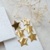 Gold maxi star drop earrings