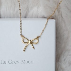 gold bow connector necklace