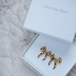 gold festive bow stud earrings